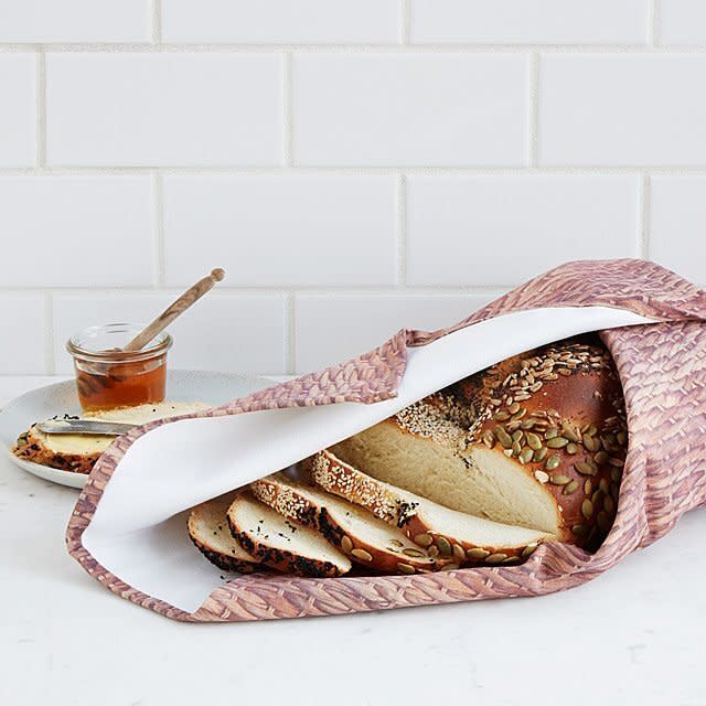 Put your gift to good use immediately. <a href="https://fave.co/35iIduA" target="_blank" rel="noopener noreferrer">This bread warming blanket</a>&nbsp;keeps your favorite loaf warm and fresh for much longer than the traditional napkin. Heat it in the microwave, place your bread in the blanket's pouch, and wrap it all up.