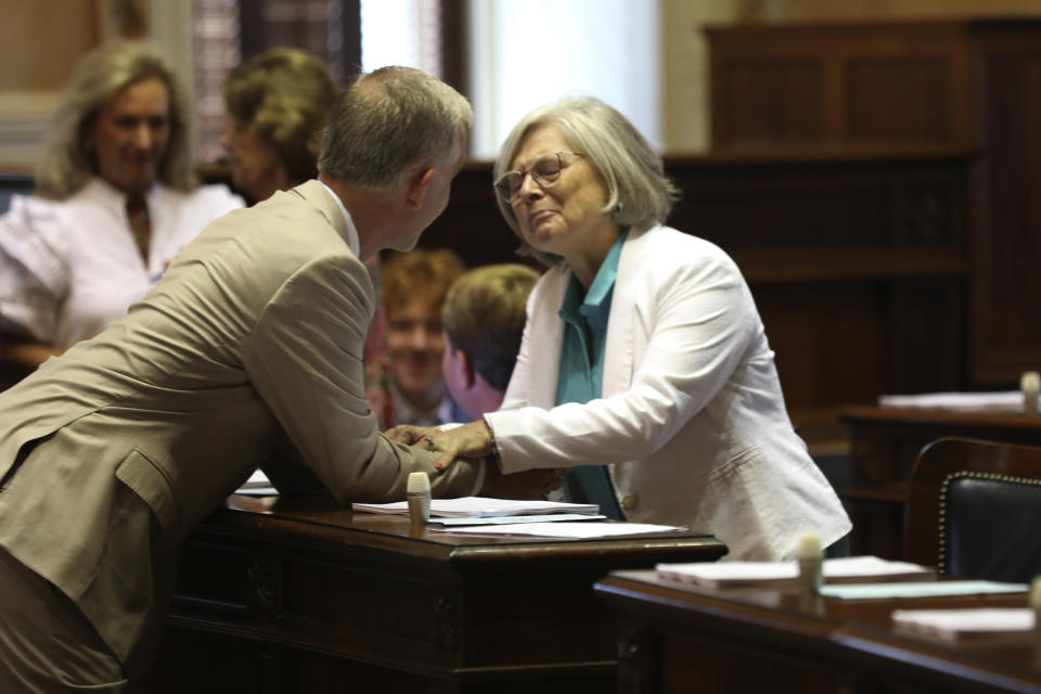 South Carolina Sen. Katrina Shealy, R-Lexington, right, talks to Sen. Michael Johnson, R-Tega Cay, the morning after she lost her runoff on Wednesday, June 26, 2024, in Columbia, S.C. Shealy and other other two Republican women Sister Senators were all voted out in their party's primary. (AP Photo/Jeffrey Collins)