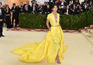 <p>Also wearing Ralph Lauren, Lily Aldridge was a ray of sunshine on the night in this bright yellow number. Photo: Getty Images </p>