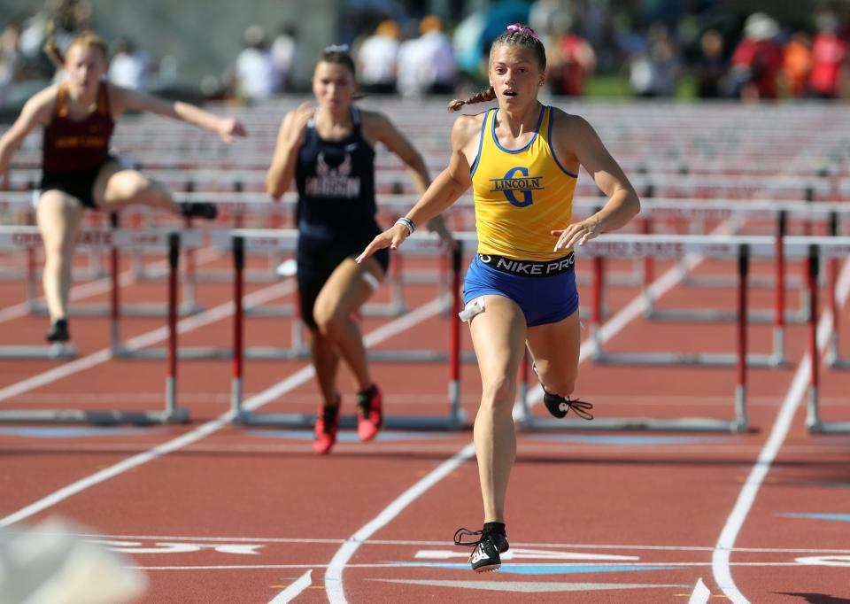 Gahanna Lincoln's Camden Bentley crosses the finish in the 100 meter hurdles during the Division I State Track and Field Tournament on June 3 at Ohio State University's Jesse Owens Memorial Stadium in Columbus.