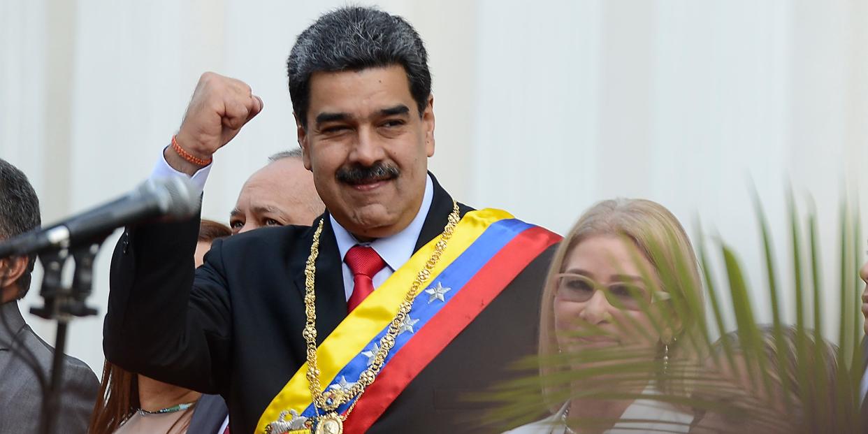 Venezuela's President Nicolas Maduro, waves as he arrives at the National Constituent Assembly's building during the celebration rally of the 20th anniversary of the Venezuelan Constitution in Caracas, Venezuela, Sunday, Dec. 15, 2019. (AP Photo/Matias Delacroix)