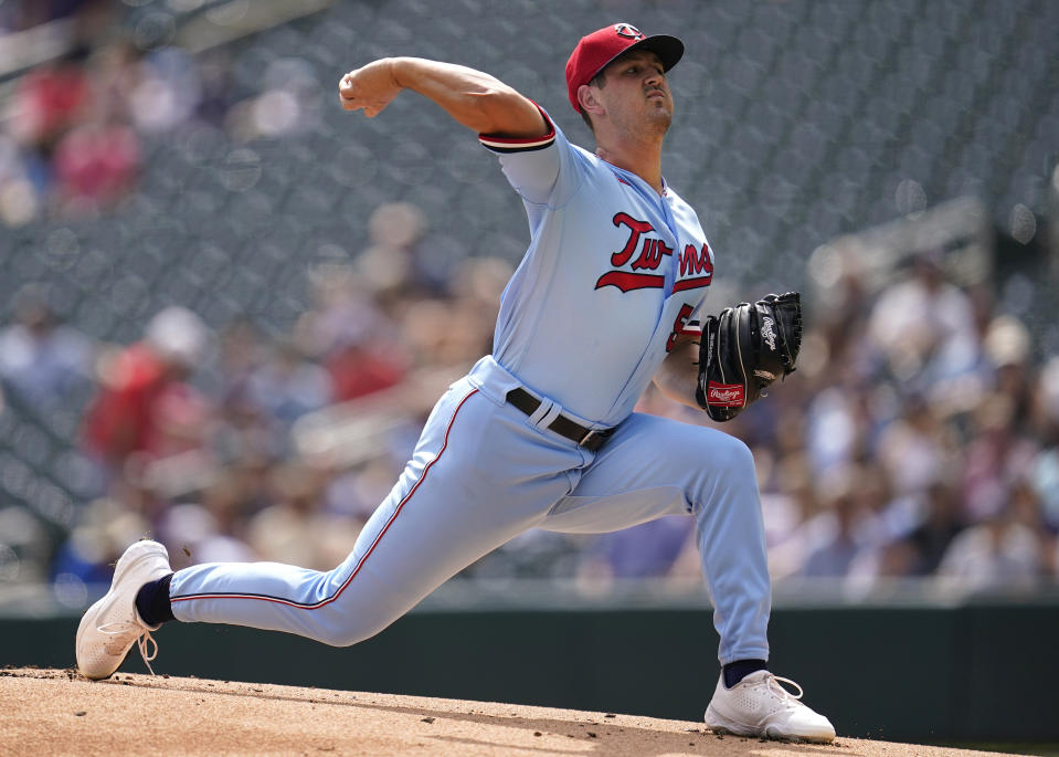 Minnesota Twins starting pitcher Tyler Mahle delivers against the Kansas City Royals during the first inning of a baseball game Wednesday, Aug. 17, 2022, in Minneapolis. (AP Photo/Abbie Parr)