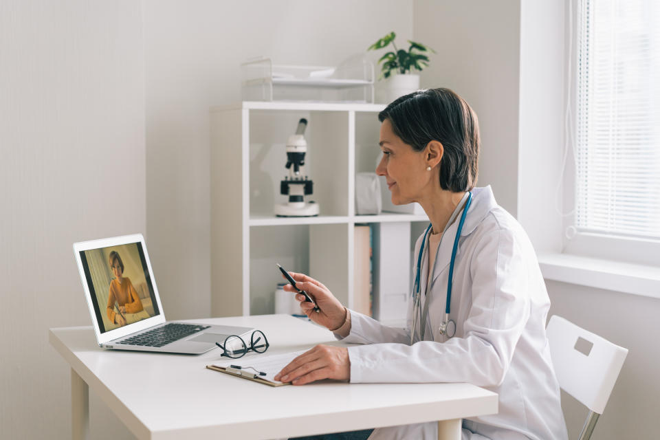 Doctor having virtual appointment with patient