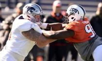 Jan 24, 2019; Mobile, AL, USA; North offensive tackle Dalton Risner of Kansas State (71) blocks against North defensive end L.J. Collier of TCU (91) during the North squad 2019 Senior Bowl practice at Ladd-Peebles Stadium. Mandatory Credit: John David Mercer-USA TODAY Sports