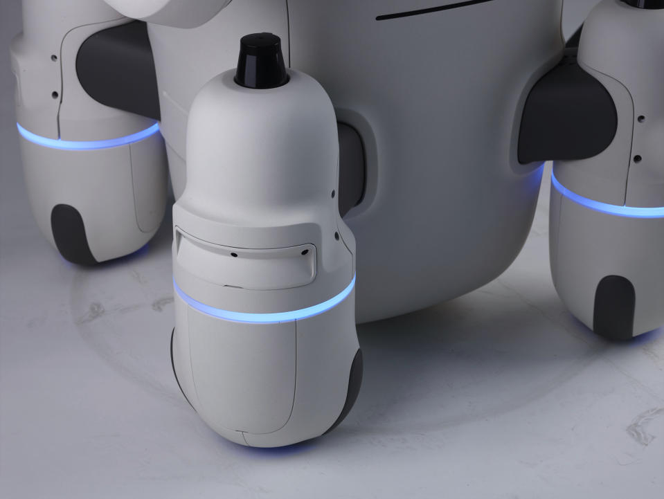 Various press images of the Hyundai DAL-e customer service robot.