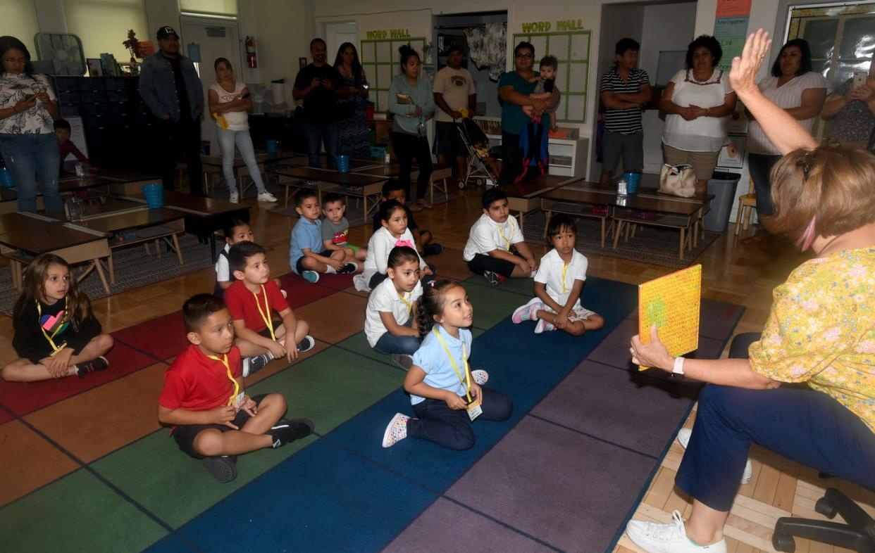 <span class="caption">Few first days the new school year will look like this in 2020.</span> <span class="attribution"><a class="link " href="https://www.gettyimages.com/detail/news-photo/mrs-davis-reads-no-david-by-david-shannon-to-her-students-news-photo/1170764426" rel="nofollow noopener" target="_blank" data-ylk="slk:Brittany Murray/MediaNews Group/Long Beach Press-Telegram via Getty Images;elm:context_link;itc:0;sec:content-canvas">Brittany Murray/MediaNews Group/Long Beach Press-Telegram via Getty Images</a></span>