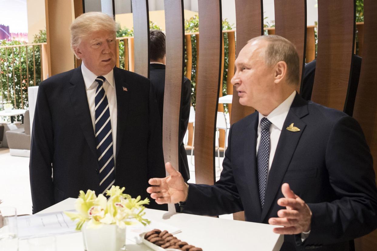 Donald Trump with Vladimir Putin during the Hamburg G20 summit: Getty