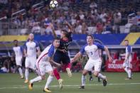 Jul 22, 2017; Arlington, TX, USA; United States defender Jorge Villafan (2) and defender Matt Besler (5) defend against Costa Rica midfielder David Guzman (20) during the first half at AT&T Stadium. Mandatory Credit: Jerome Miron-USA TODAY Sports