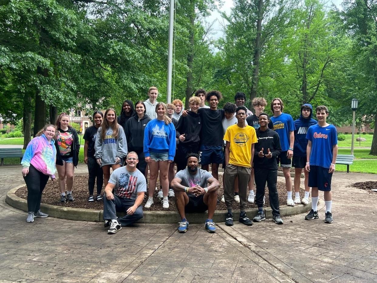 Members of the Coventry Local School District's Comet Unity club recently helped beautify the landscape at Firestone Park Community Center in Akron.