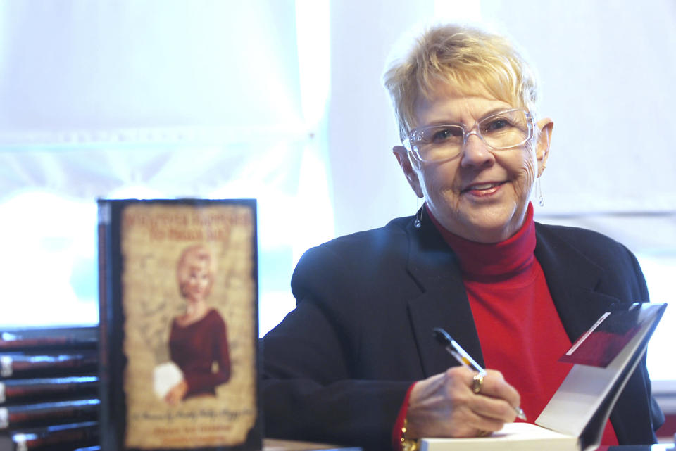 <p> FILE - In this Jan. 11, 2008, file photo, Peggy Sue Gerron unveils her new book "What Ever Happened to Peggy Sue" during a press conference in Tyler, Texas. Gerron, the Texas woman who inspired the 1958 Buddy Holly song "Peggy Sue" has died at a Lubbock hospital. Gerron Rackham of Lubbock died Monday, Oct. 1, 2018, at University Medical Center. She was 78. (Jaime R. Carrero/Tyler Morning Telegraph, via AP, File) </p>