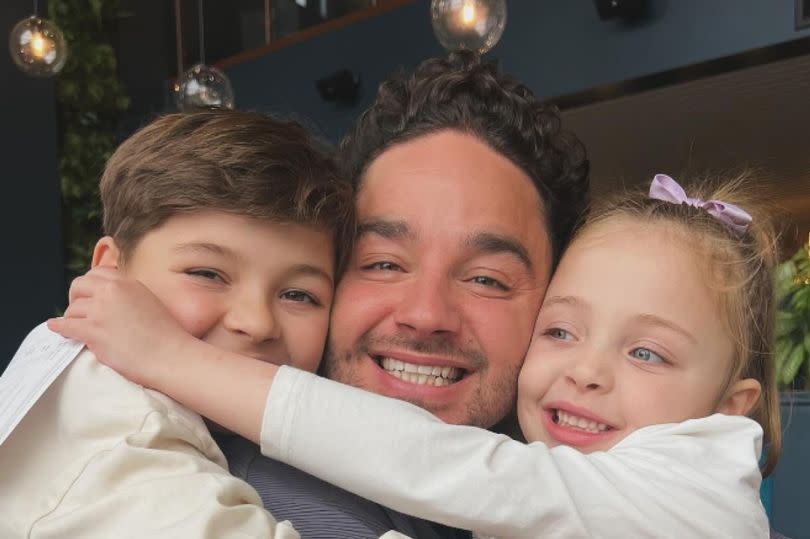 Adam Thomas with his children Teddy and Elsie