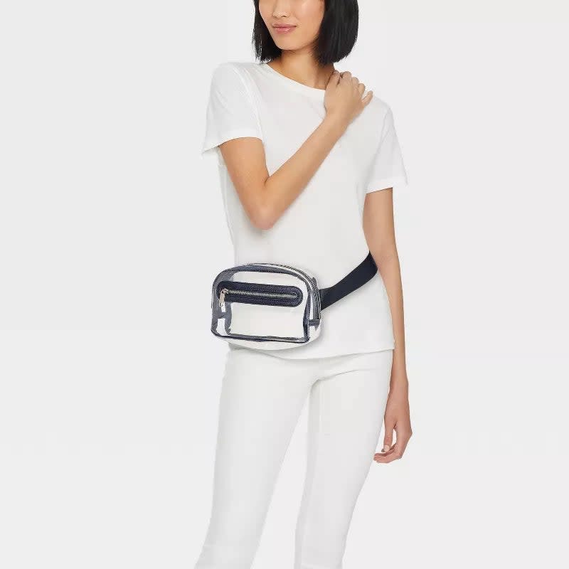 A model wearing the belt bag in the color Clear