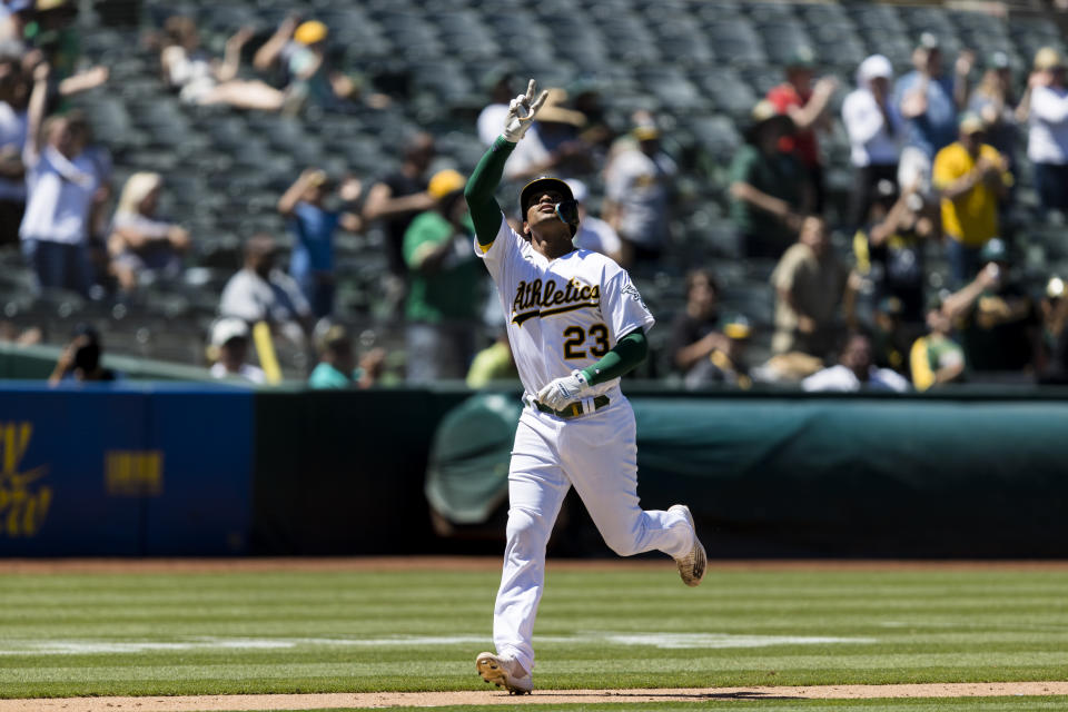 Oakland Athletics' Christian Bethancourt gestures as he nears home plate after hitting a two-run home run against the Houston Astros during the seventh inning of a baseball game in Oakland, Calif., Wednesday, June 1, 2022. (AP Photo/John Hefti)