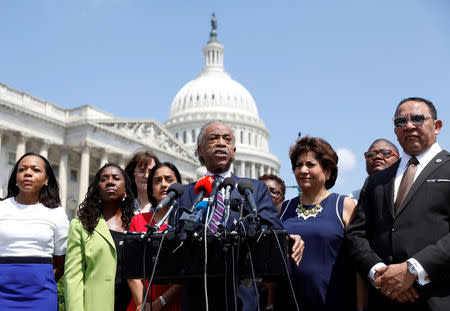 Rev. Al Sharpton holds a news conference in front of the U.S. Capitol to call on the Trump administration to stop separating children from their families at the U.S. border in Washington, U.S., June 19, 2018. REUTERS/Kevin Lamarque