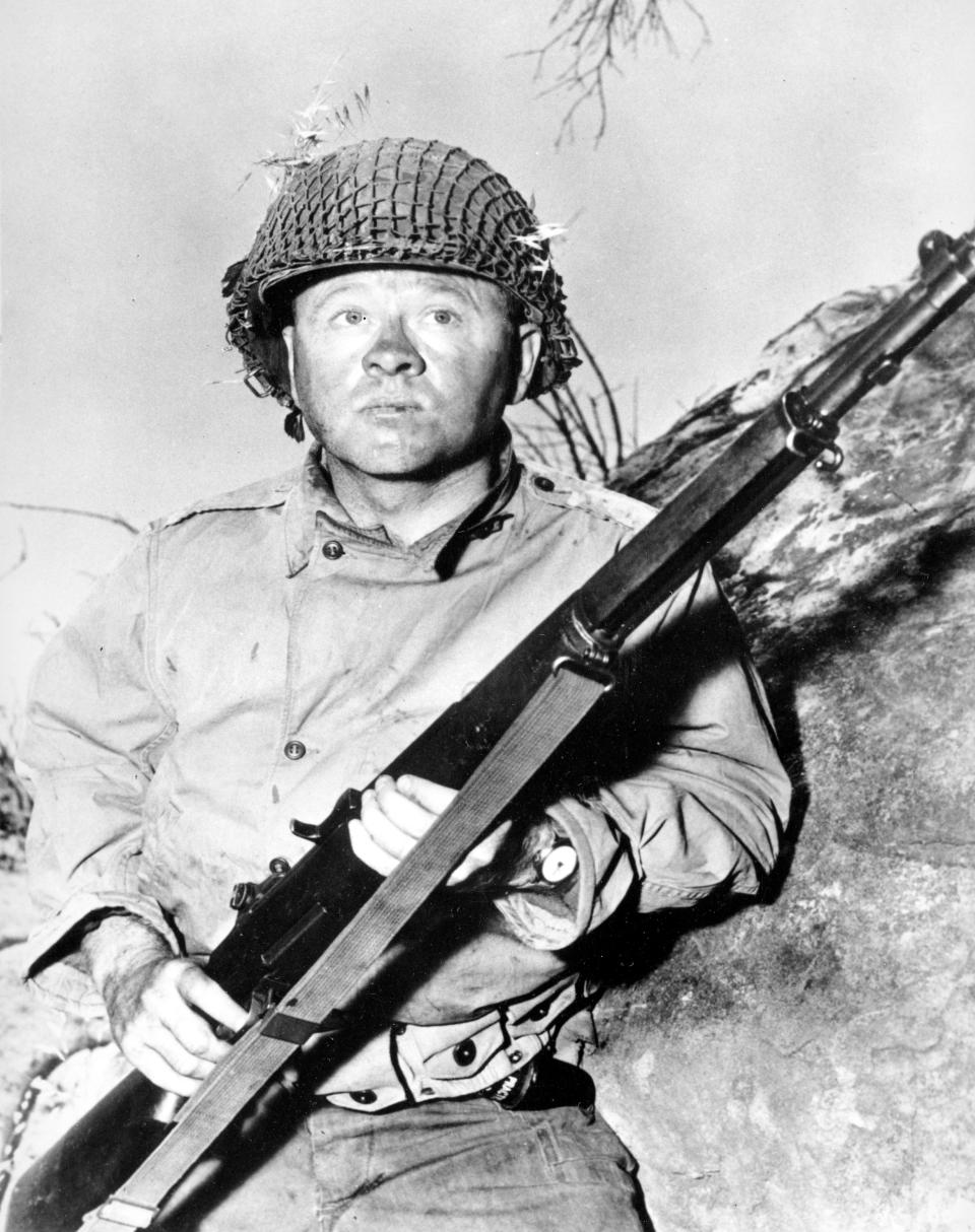 FILE - Actor Mickey Rooney is shown in this file photo as G.I. Dooley in the 1956 Hollywood movie "The Bold and the Brave." Rooney, a Hollywood legend whose career spanned more than 80 years, died Sunday, April 6, 2014, at his North Hollywood, Calif. home. He was 93. (AP Photo/File)