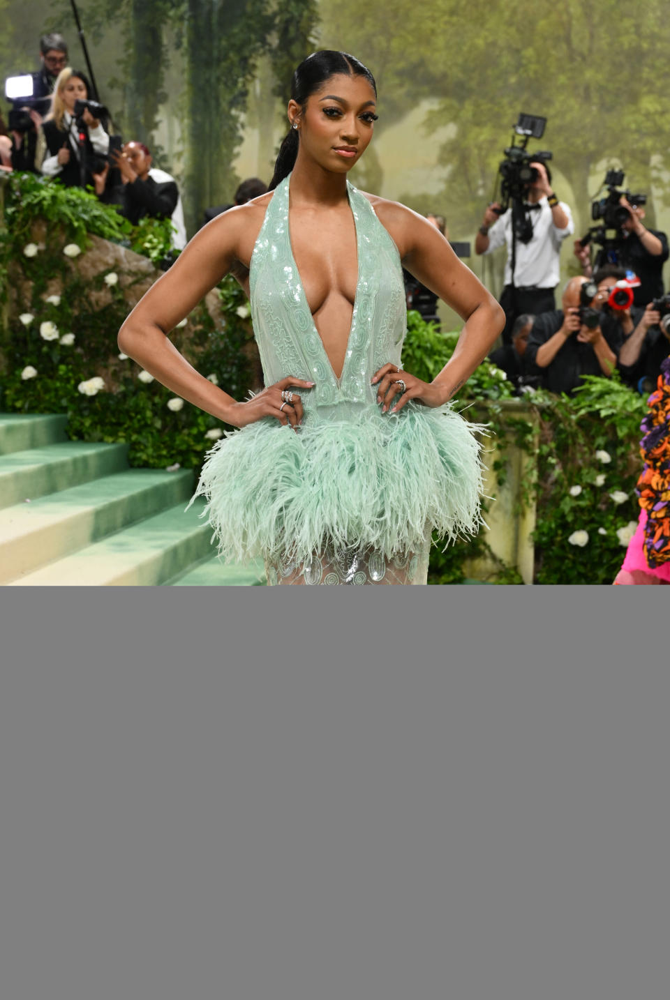 Angel reese at the 2024 met gala in a plunge sequin dress