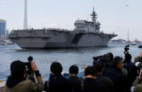 Japan Maritime Self-Defense Force's (JMSDF) latest Izumo-class helicopter carrier DDH-184 Kaga leaves a port after a handover ceremony for the JMSDF by Japan Marine United Corporation in Yokohama, Japan March 22, 2017. REUTERS/Toru Hanai