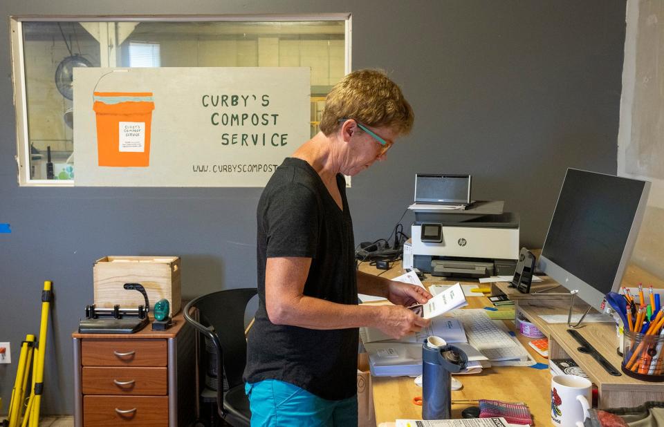 Susan Bonucci, in her office at Curby's Compost Service, has found a way to make composting profitable.