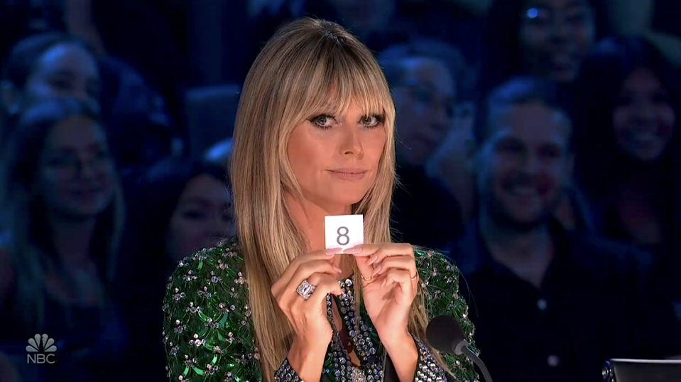 Heidi Klum reveals her number on 'America's Got Talent.' (Photo: NBC)