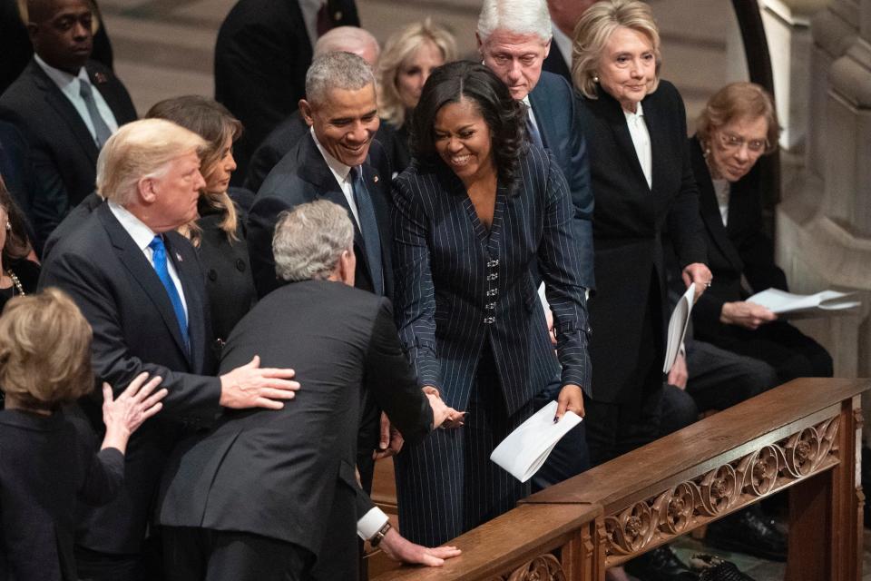 President George W. Bush and wife Laura Bush greets President Donald Trump, first lady Melania Trump, former President Barack Obama, Michelle Obama, during a State Funeral for former President George H.W. Bush at the National Cathedral, Wednesday, Dec. 5, 2018, in Washington.