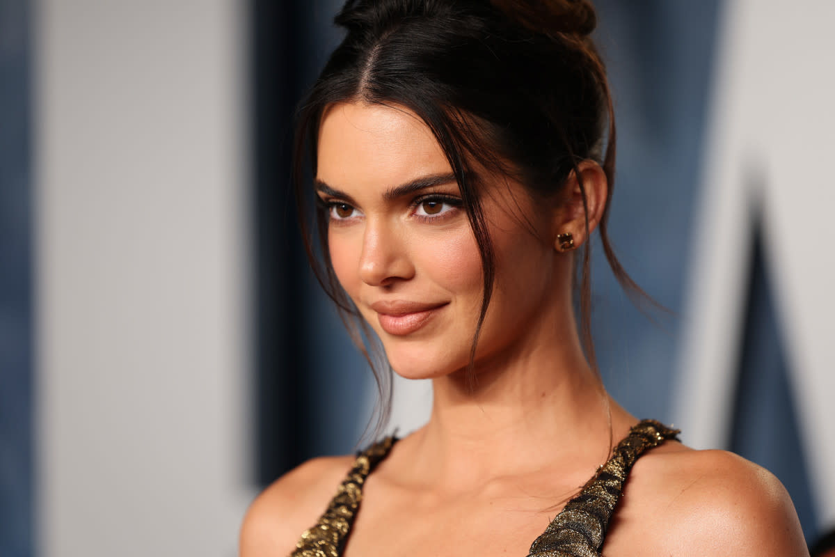 Kendall Jenner Shows Off Her Assets in Risqué Red Skintight Gown