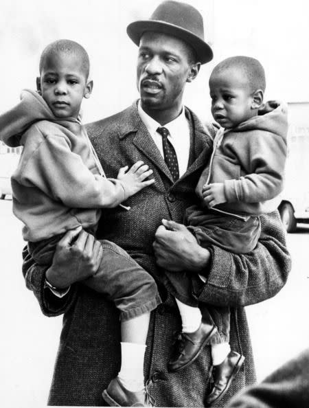 APRIL 7: Bill Russell and his sons, Budda, 3, and Jacob, 20 months. (Photo by Paul Connell/The Boston Globe via Getty Images)