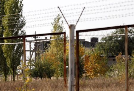 A general view shows a partially constructed building on the territory of an old military depot near the Russian-Ukrainian border in the town of Boguchar, south of Voronezh, Russia, September 21, 2015. REUTERS/Anton Zverev