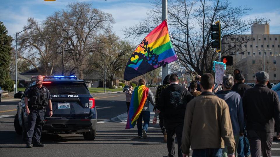 About 150 gathered in Richland to march to City Hall on April 18 to speak to the council about what appears to be a lack of support for a restaurant’s long-running all-ages drag shows.