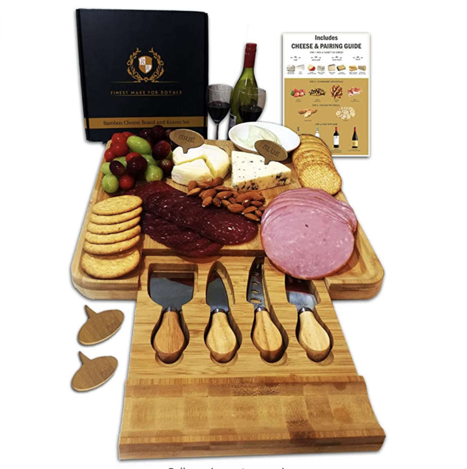 Cheeseboard set, bamboo serving tray with cutlery knives in a drawer, S$105.74. PHOTO: Amazon