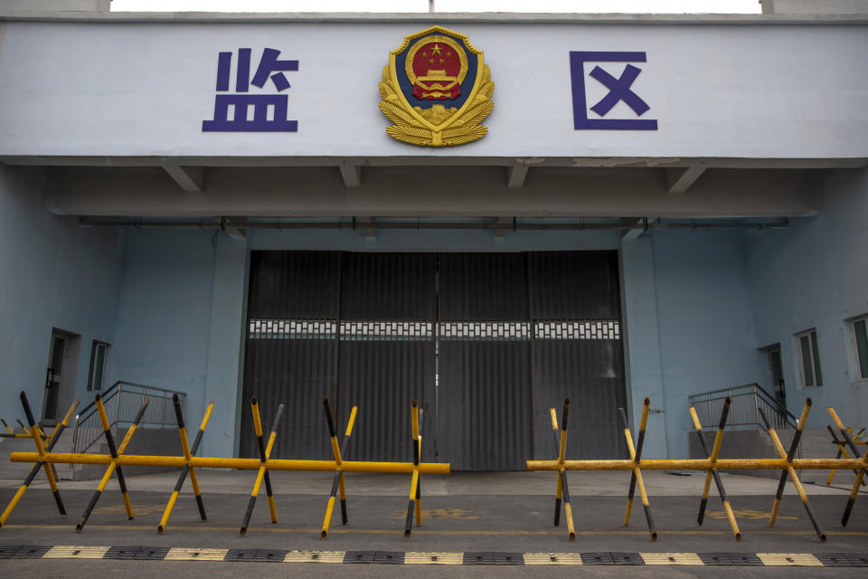 Barricades stand in front of a vehicle entrance to the inmate detention area at the Urumqi No. 3 Detention Center in Dabancheng in western China's Xinjiang Uyghur Autonomous Region on April 23, 2021. Urumqi No. 3, China's largest detention center, is twice the size of Vatican City and has room for at least 10,000 inmates. (AP Photo/Mark Schiefelbein)