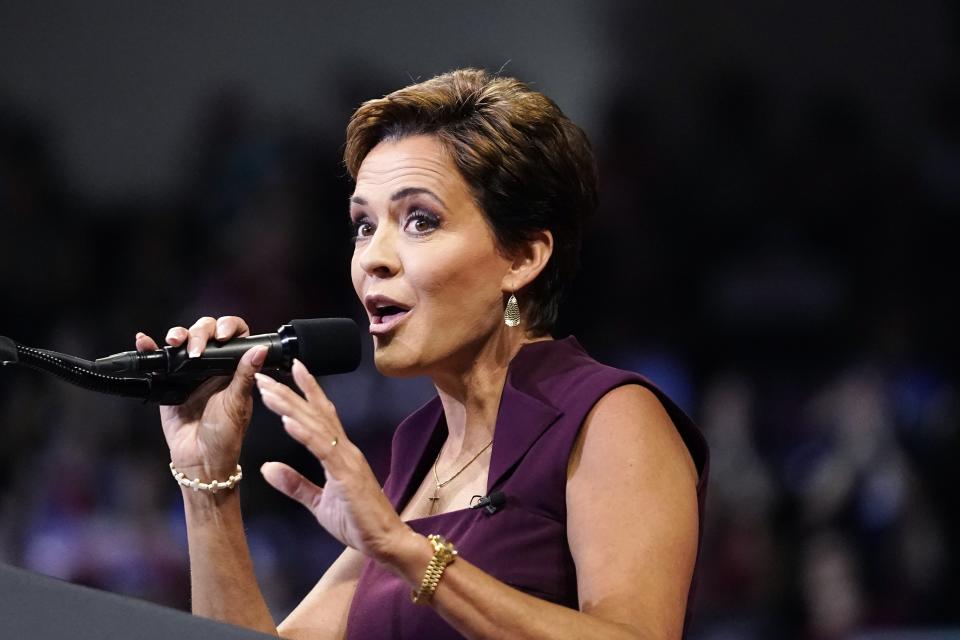 Kari Lake, who is running for the Republican nomination for Arizona governor, speaks on stage prior to former President Donald Trump speaking at a Save America rally Friday, July 22, 2022, in Prescott, Ariz. (AP Photo/Ross D. Franklin)