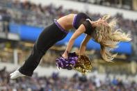 <p>A Baltimore Ravens cheerleader flies through the air during the first half of an NFL football game against the Cincinnati Bengals in Baltimore, Sunday, Nov. 27, 2016. (AP Photo/Nick Wass) </p>