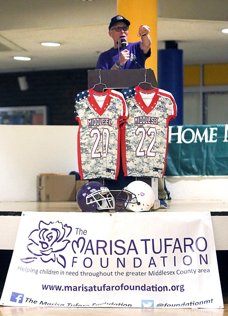 Marcus Borden, the Marisa Rose Bowl charity all-star football game founder and director, talks at the press conference to introduce the participants on May 9, 2022 at North Brunswick High School