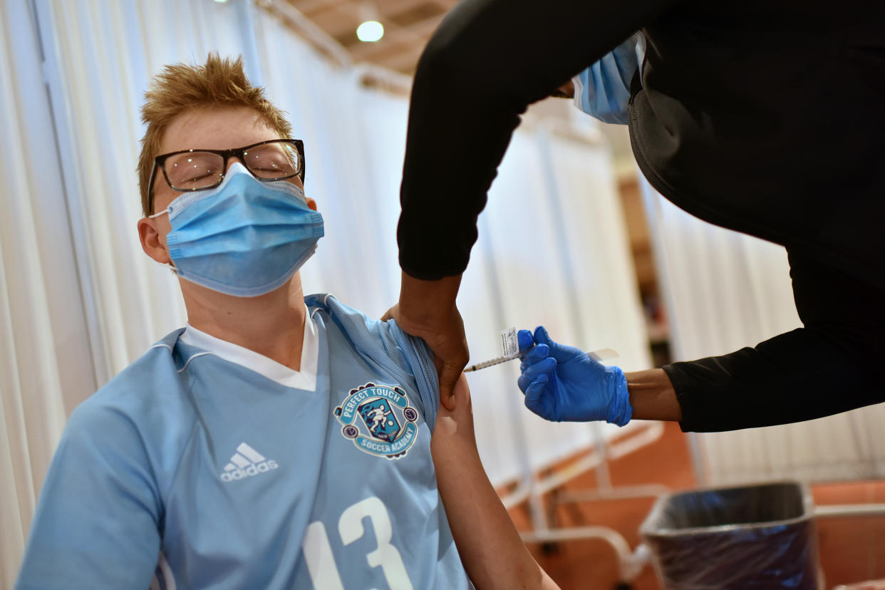 Nicolas (last name withheld), 15, receives his first dose of the Pfizer COVID-19 vaccine from a register nurse at the Northwell Health Vaccine Center Bedford Hills Community Site in Bedford Hills, NY, May 16, 2021. The United States expanded vaccine eligibility to ages 12-15 as the CDC authorized the emergency use of the Pfizer COVID-19 on May 10. (Photo by Anthony Behar/Sipa USA)