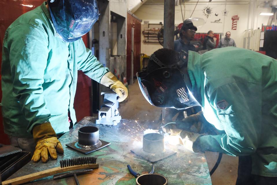 Erie High School sophomores Jacob Sanfelice, 16, left, and Michael Ali, 15, practice welds as part of the schools career and technical education program on Jan. 5. The students were preparing for a Skills USA competition.
