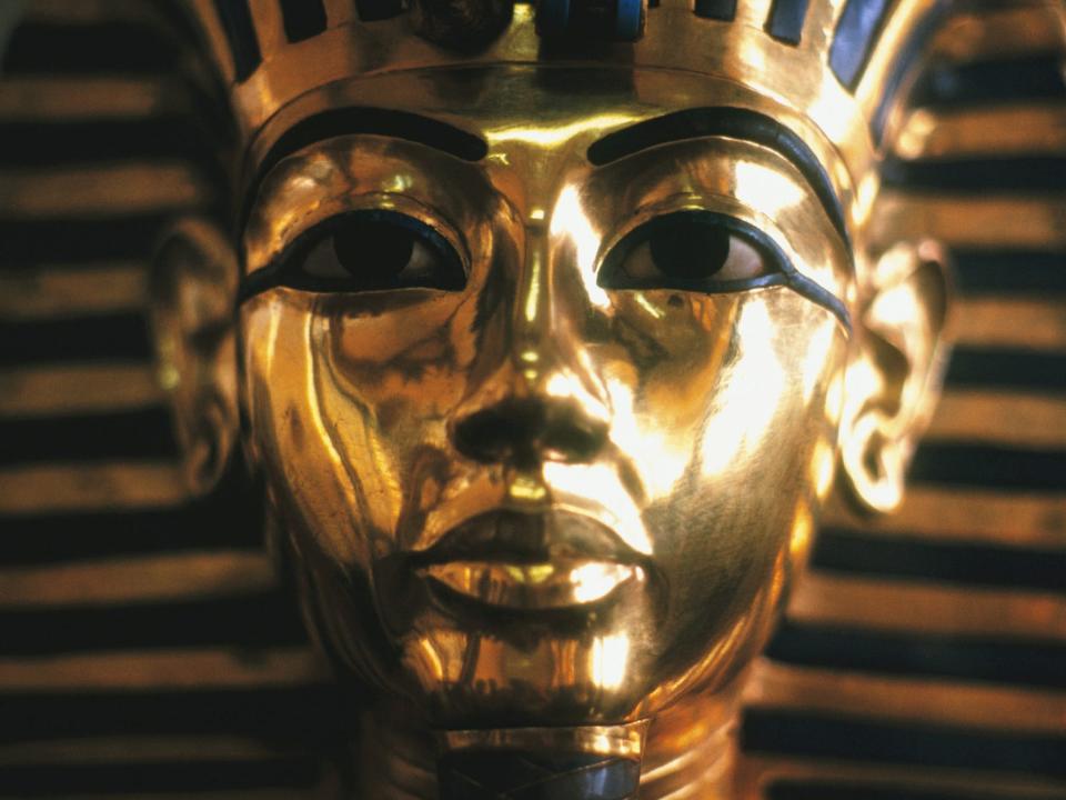 a stock photo shows KING TUTANKHAMEN GOLD MASK, CAIRO EGYPT