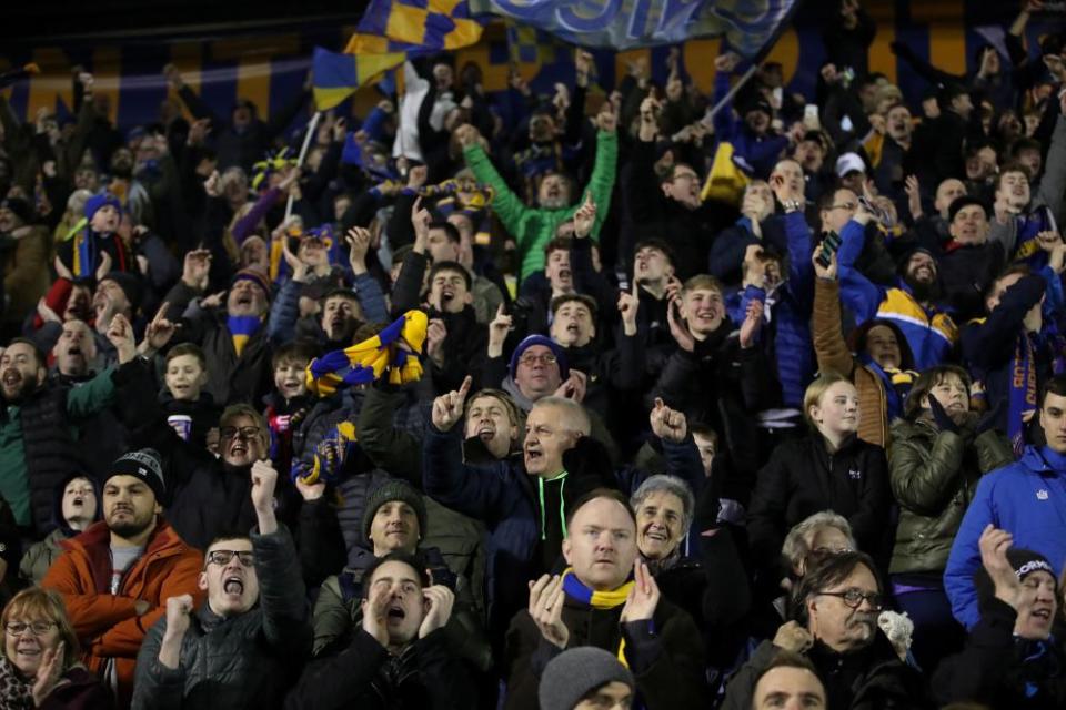 Shrewsbury Town fans celebrate their equaliser