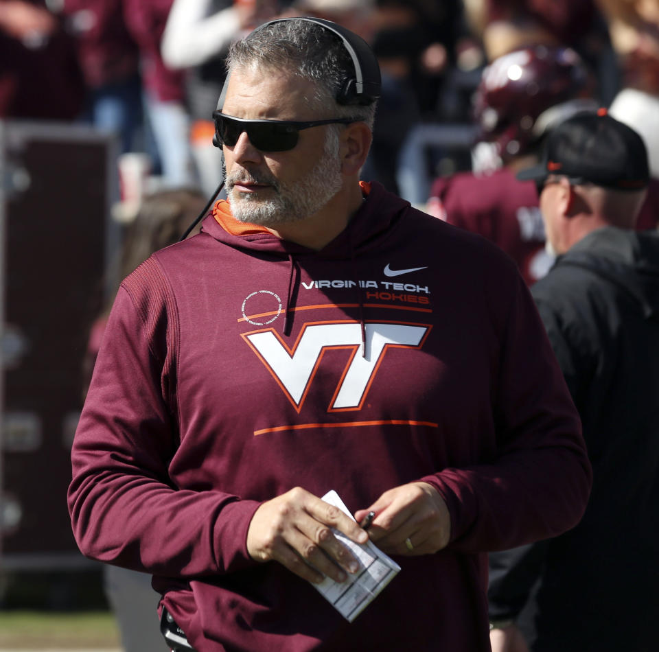 Virginia Tech head coach Justin Fuente watches from the sideline during an NCAA college football game against Syracuse in Blacksburg Va., Saturday, Oct. 23 2021. (Matt Gentry/The Roanoke Times via AP)