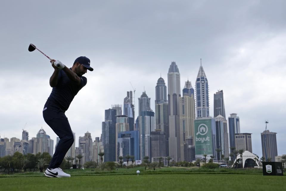 Shubhankar Sharma of India tees off on the 8th hole during his first round on Day Two of the Dubai Desert Classic, in Dubai, United Arab Emirates, Friday, Jan. 27, 2023. (AP Photo/Kamran Jebreili)