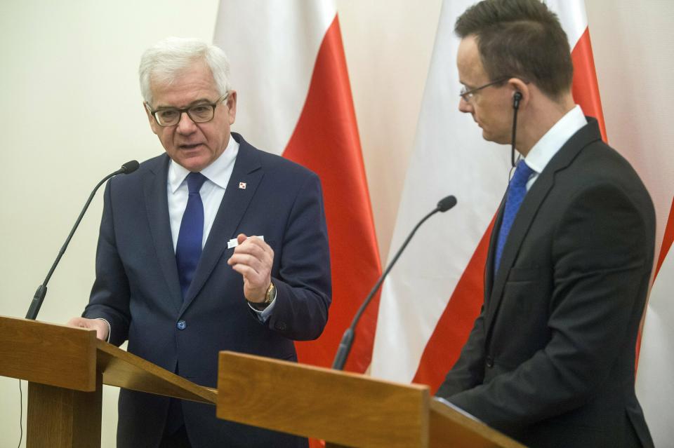 Hungarian Minister of Foreign Affairs and Trade Peter Szijjarto, right, and Polish Minister of Foreign Affairs Jacek Czaputowicz hold a joint press conference at the Minister of Foreign Affairs and Trade in Budapest, Hungary, Wednesday, Feb. 27, 2019. (Zoltan Balogh/MTI via AP)