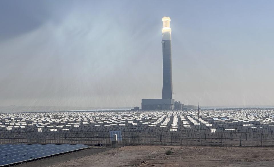 PHOTO CREDIT: CAROLINE CHOI The Mohammed bin Rashid Al Maktoum Solar Park is the world's largest single-site solar park in the world. Its 860-foot-high tower uses molten salt technology.