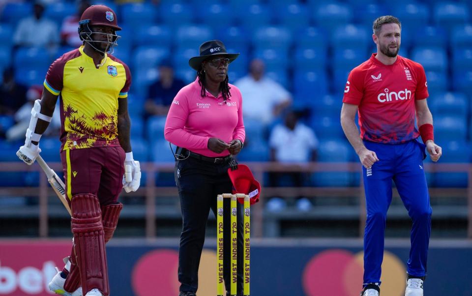 Jacqueline Williams, the first female West Indian umpire to officiate a T20 international between two full member nations, watches on as Chris Woakes bowls