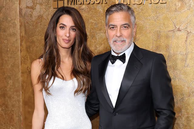 <p> Cindy Ord/Getty Images</p> Amal Clooney and George Clooney at The Albies