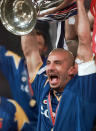 FILE - Juventus' Gianluca Vialli raises aloft the Champions Cup at the end of the final against Ajax of Amsterdam at Rome's Olympic stadium, Wednesday, May 22, 1996. Gianluca Vialli, the former Italy striker who helped both Sampdoria and Juventus win Serie A and European trophies before becoming a player-manager at Chelsea, has died on Friday, Jan. 6, 2023. He was 58. (AP Photo/Dusan Vranic, File)