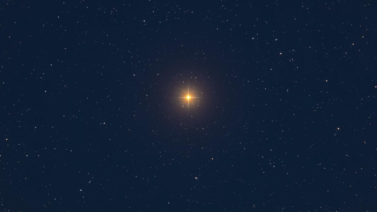  An image of Betelgeuse composed of six exposures with diffraction spikes added. 