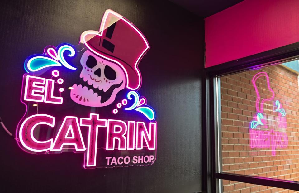 Neon signage in the entrance to the El Catrin Taco Shop on East Michigan Avenue in Lansing, seen Tuesday, Jan. 2, 2024.