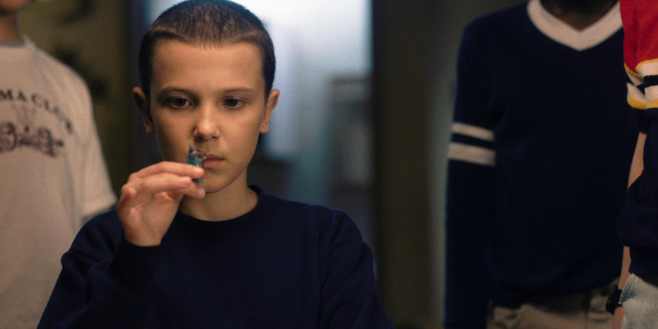 Eleven examines a toy soldier