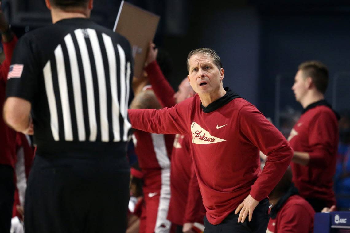 Arkansas Razorbacks head coach Eric Musselman, right, reacts to an official during the first half against his team’s 77-51 loss to the Mississippi Rebels at The Sandy and John Black Pavilion at Ole Miss on Wednesday. Petre Thomas/USA TODAY NETWORK
