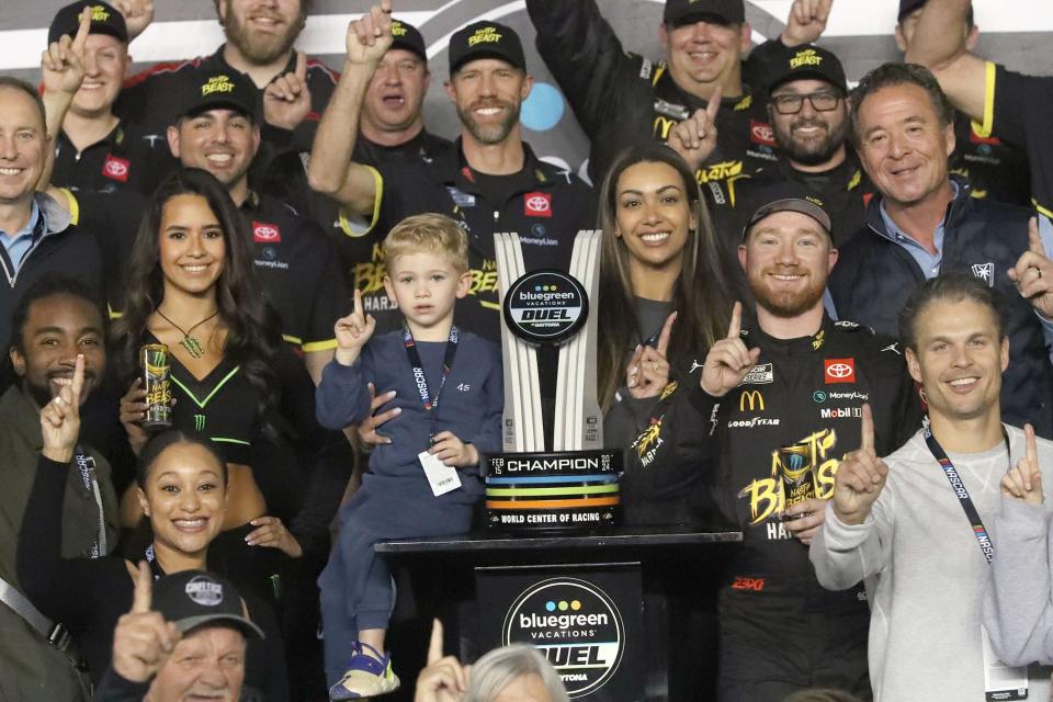 Tyler Reddick and his crew celebrate in Victory Lane after claiming a win in the first Daytona Duel on Thursday.