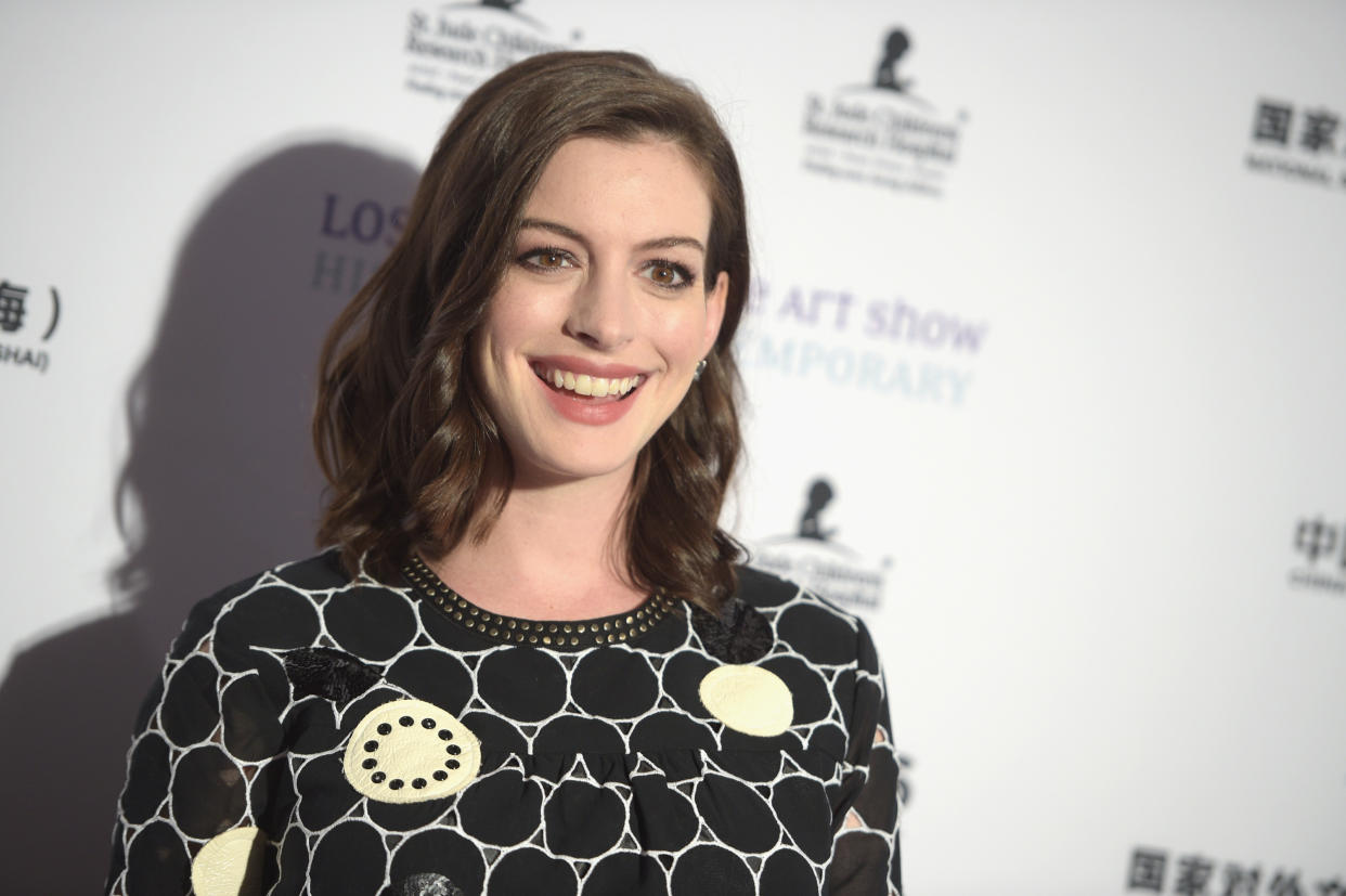 Anne Hathaway opened up about her fertility struggles, which left her "full of self-doubt". [Photo: Getty]